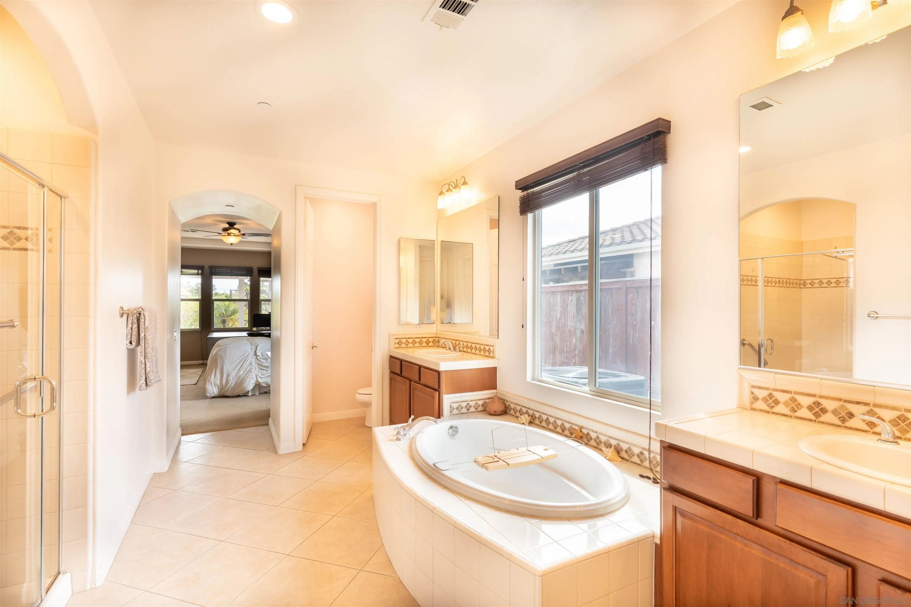 2352 Clearcrest Lane Fallbrook, CA 92028 - Photo 18 of 33 a bathroom with a sink a bathtub and a shower
