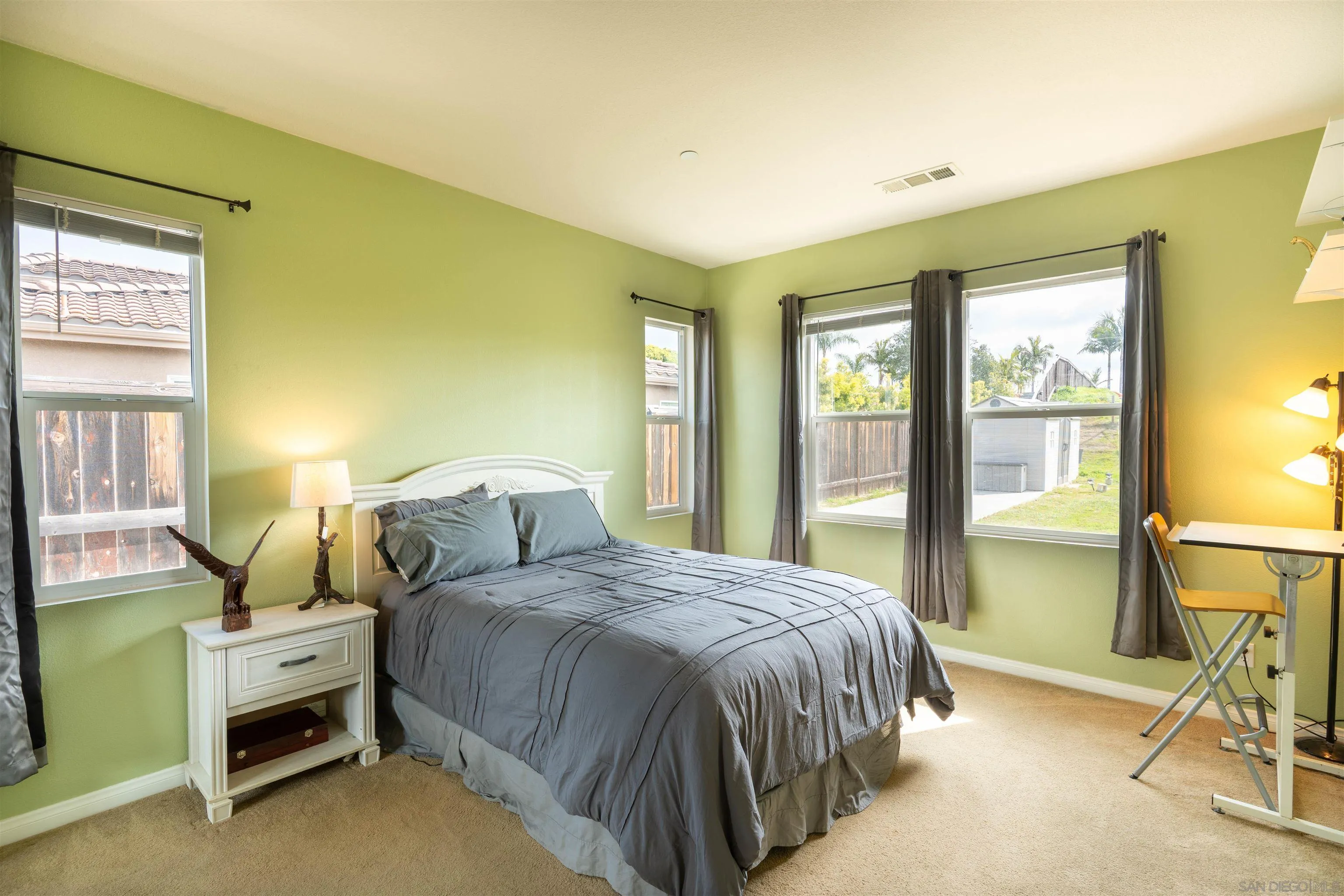 2352 Clearcrest Lane Fallbrook, CA 92028 - Photo 19 of 33 a bedroom with a bed and a window