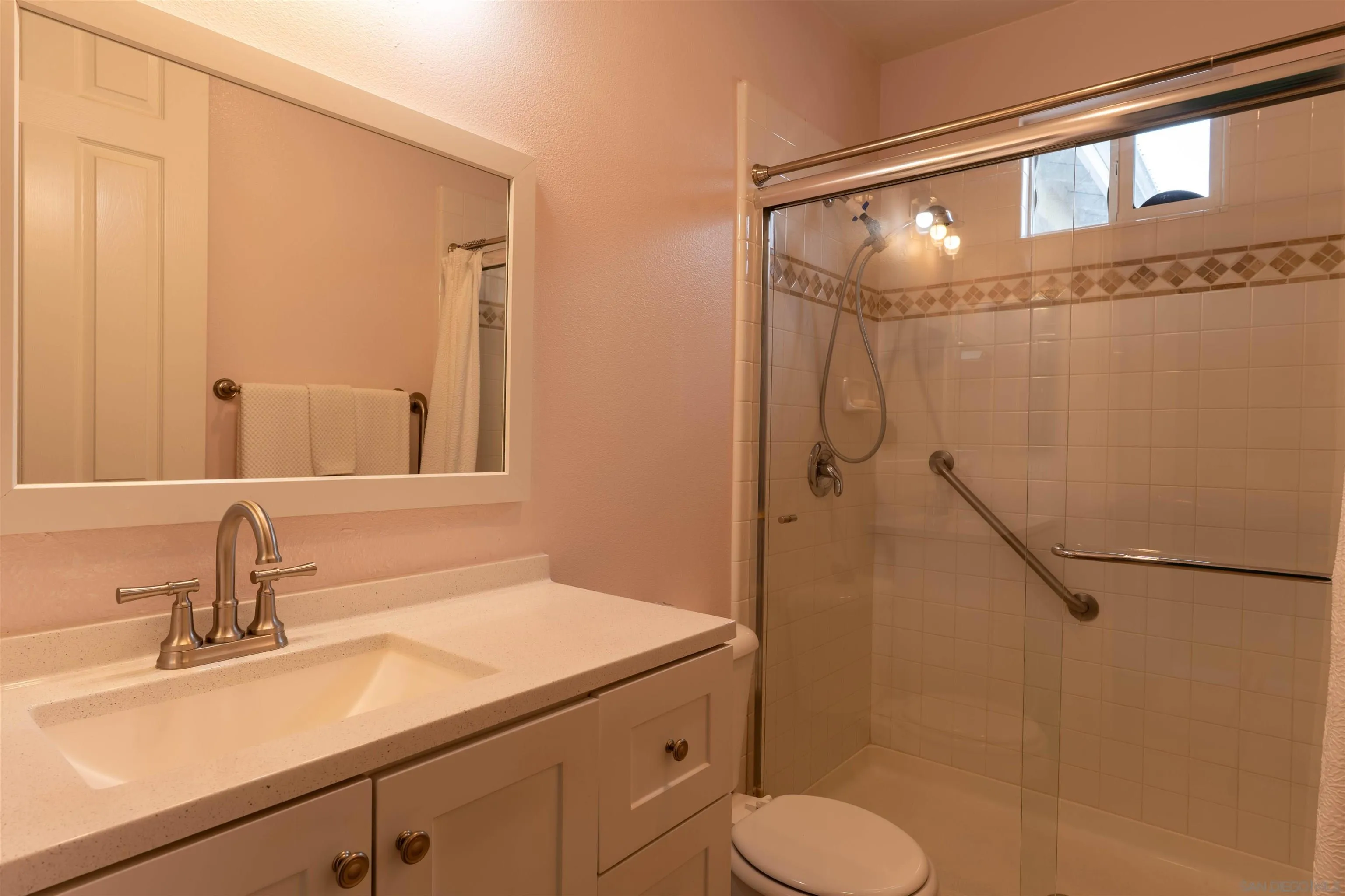 2352 Clearcrest Lane Fallbrook, CA 92028 - Photo 22 of 33 a bathroom with a sink toilet and shower