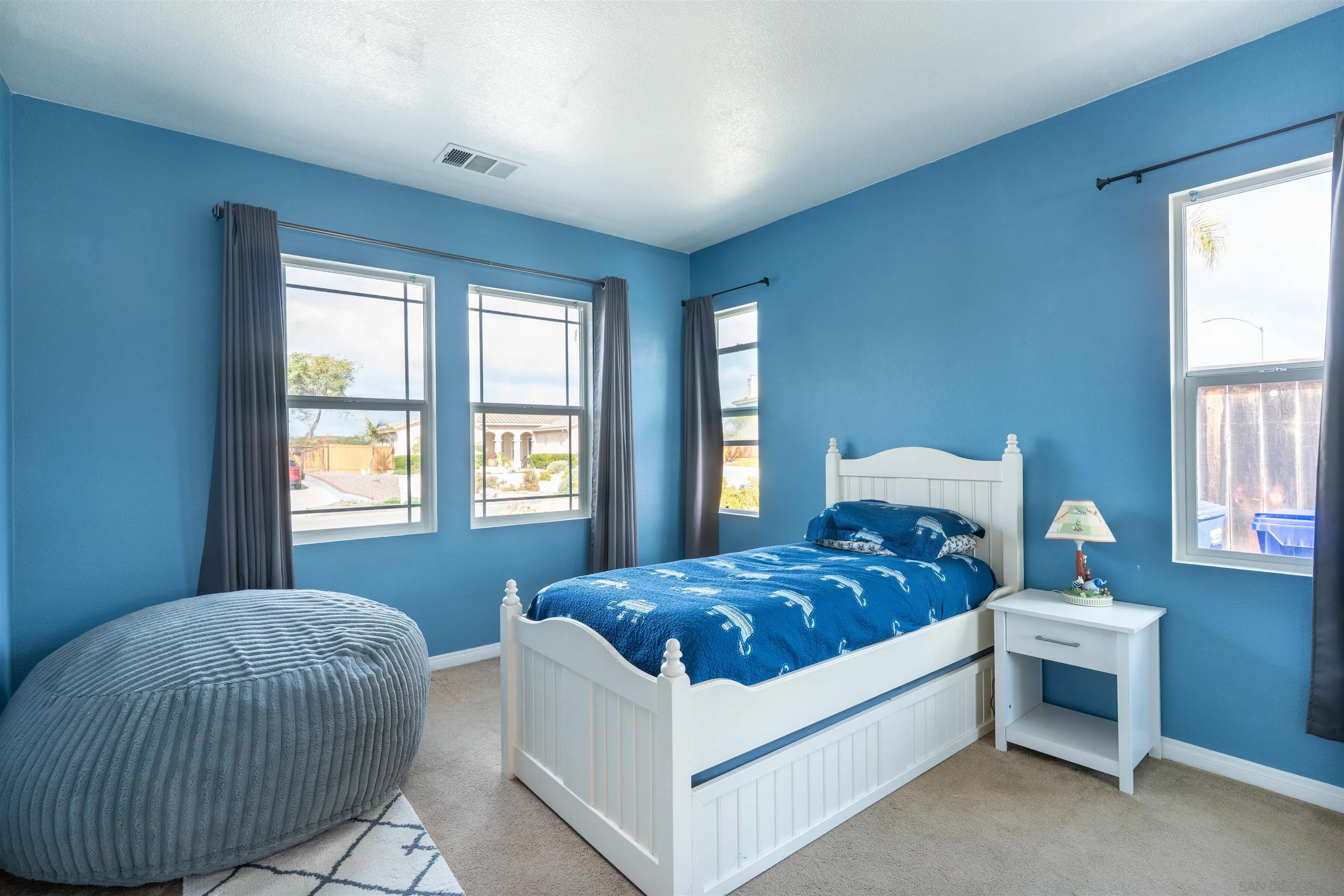2352 Clearcrest Lane Fallbrook, CA 92028 - Photo 23 of 33 a bedroom with a bed and a window