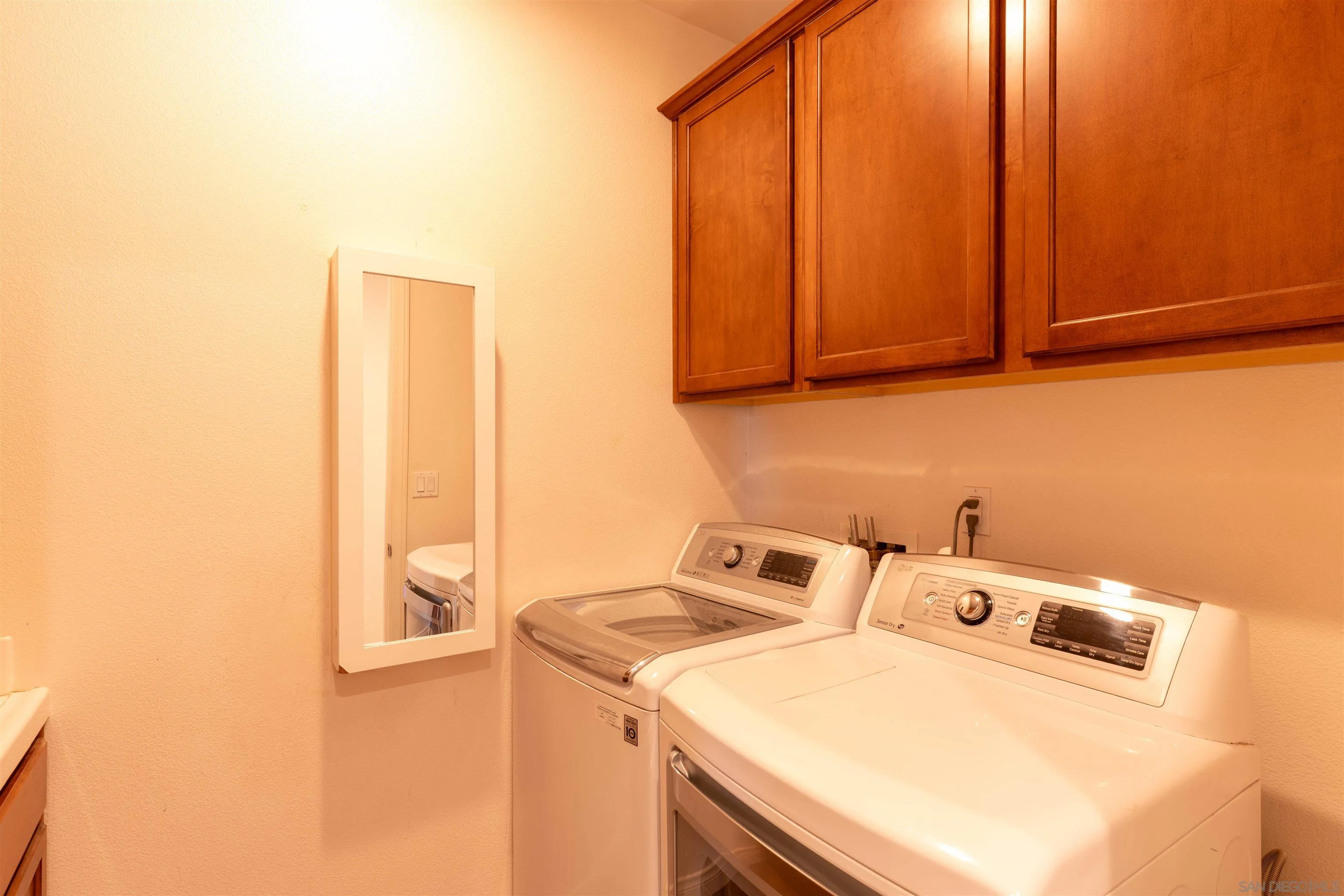2352 Clearcrest Lane Fallbrook, CA 92028 - Photo 27 of 33 a utility room with dryer and washer