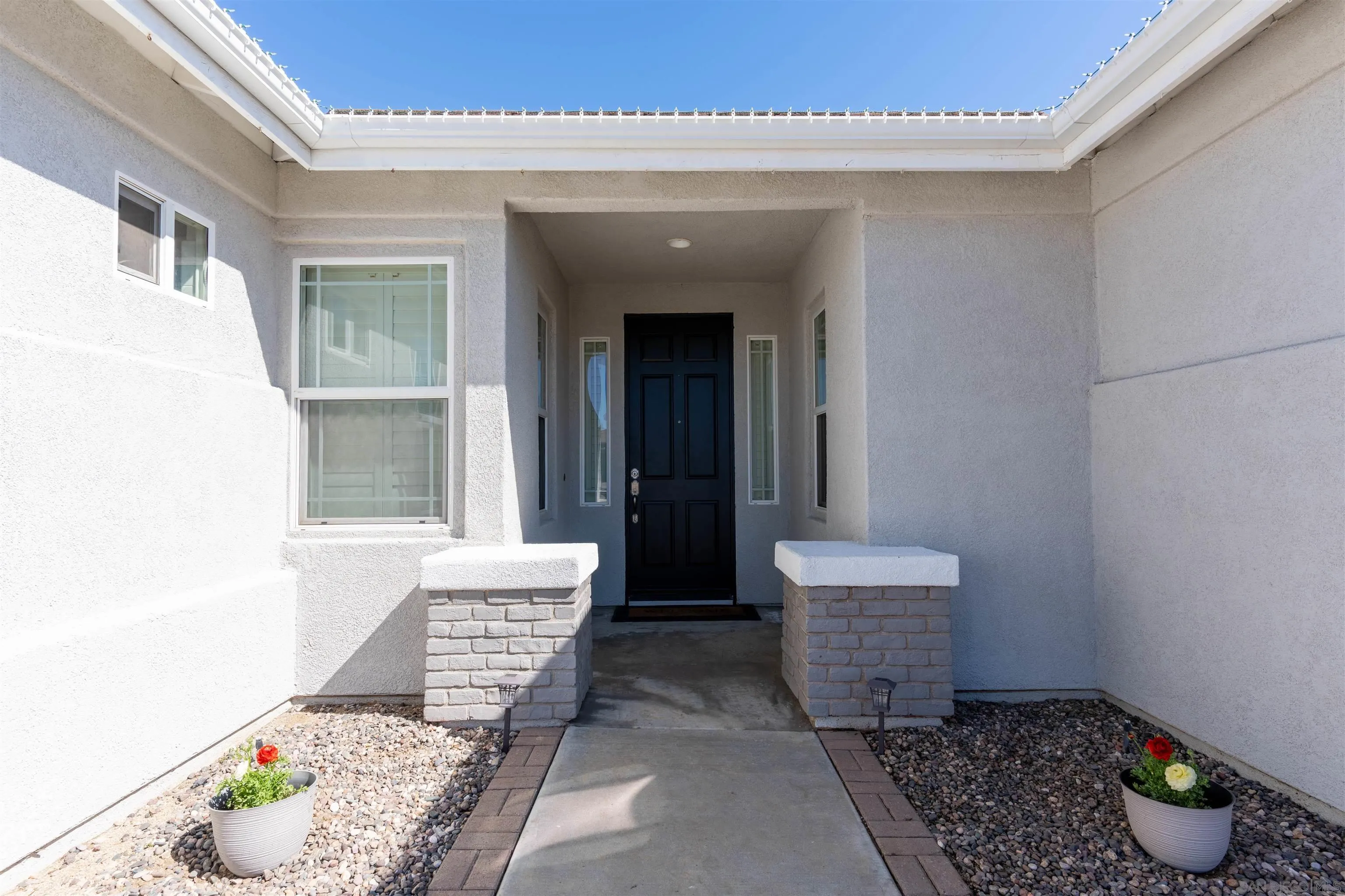 2352 Clearcrest Lane Fallbrook, CA 92028 - Photo 6 of 33 a front view of a house with chairs