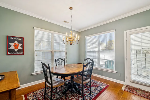 a kitchen with stainless steel appliances granite countertop a stove and refrigerator