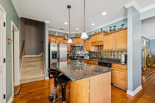 a bathroom with a sink mirror and toilet