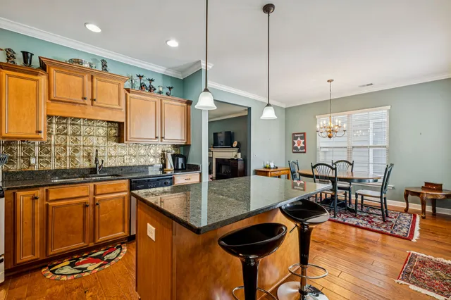 a room with a chair and gym equipment