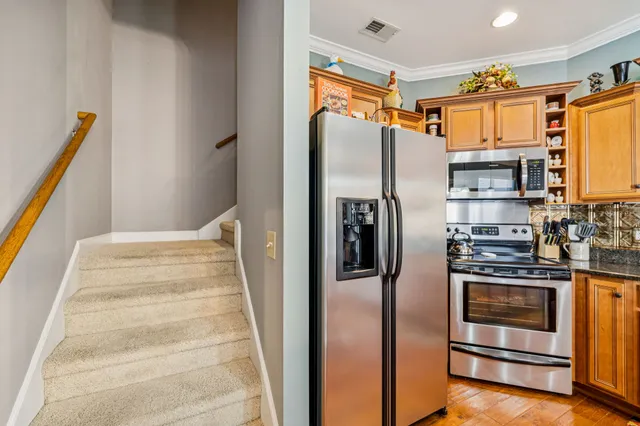 a work room with furniture and rug