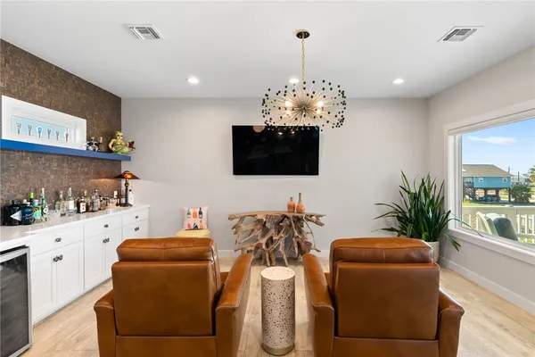 a view of living room and kitchen
