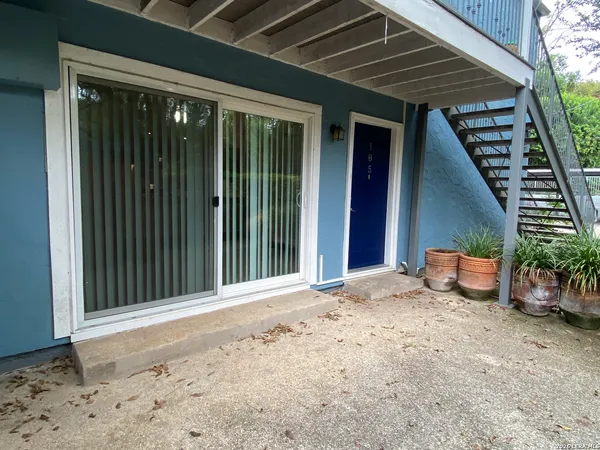 a view of a backyard of a house