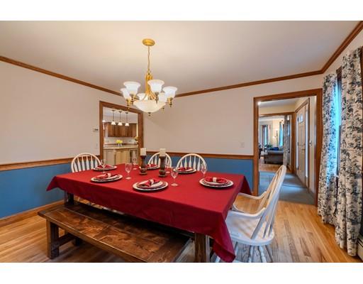 51 Groton Road Shirley, MA 01464 - Photo 13 of 30 a view of a dining room with furniture and wooden floor