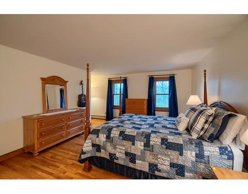 51 Groton Road Shirley, MA 01464 - Photo 15 of 30 a bedroom with a bed and window