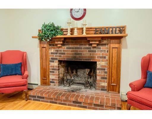 51 Groton Road Shirley, MA 01464 - Photo 8 of 30 a living room with furniture and a fireplace