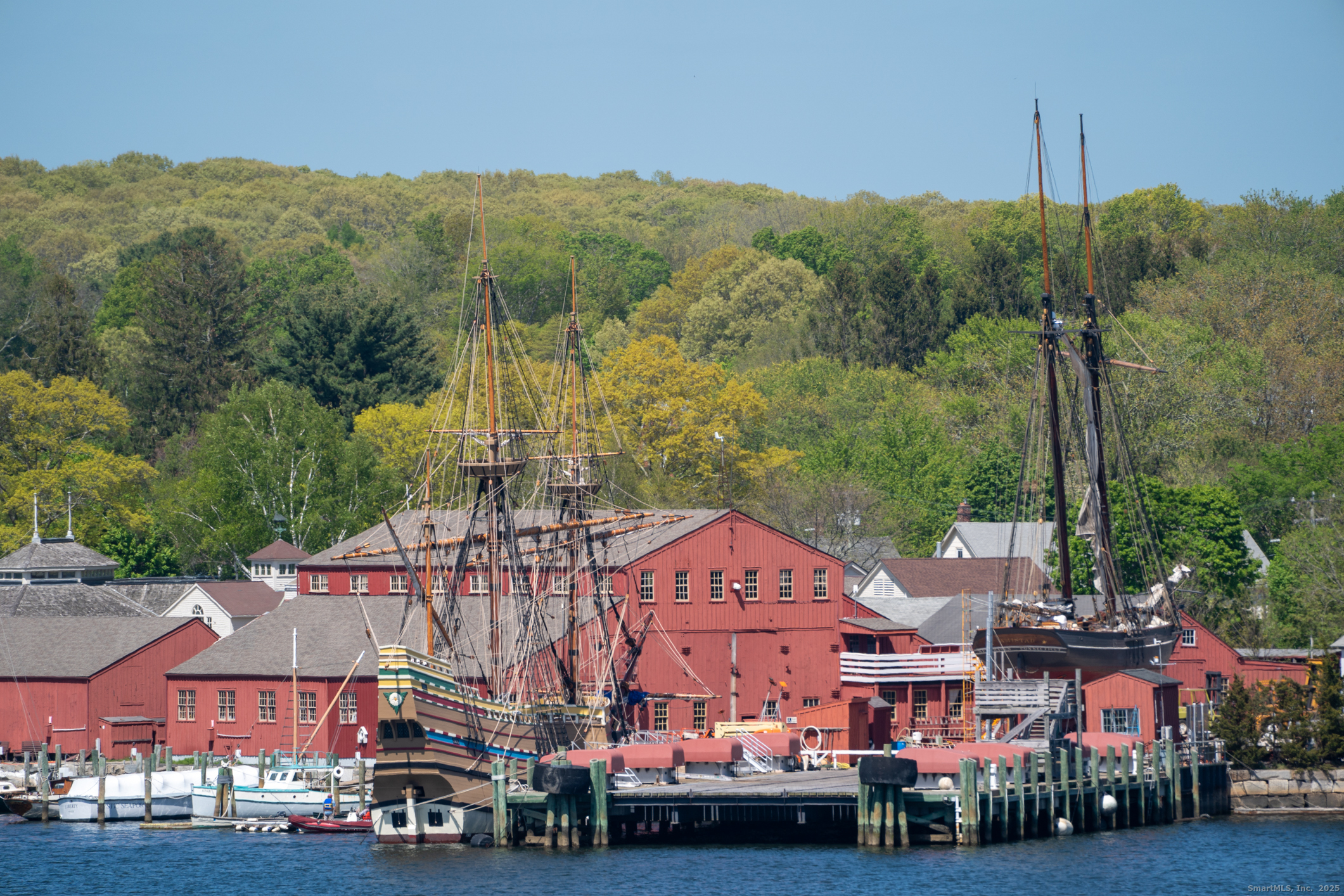 3 Water Street, Unit 305 Groton, CT 06355 - Photo 20 of 20 a view of a city that has tall trees