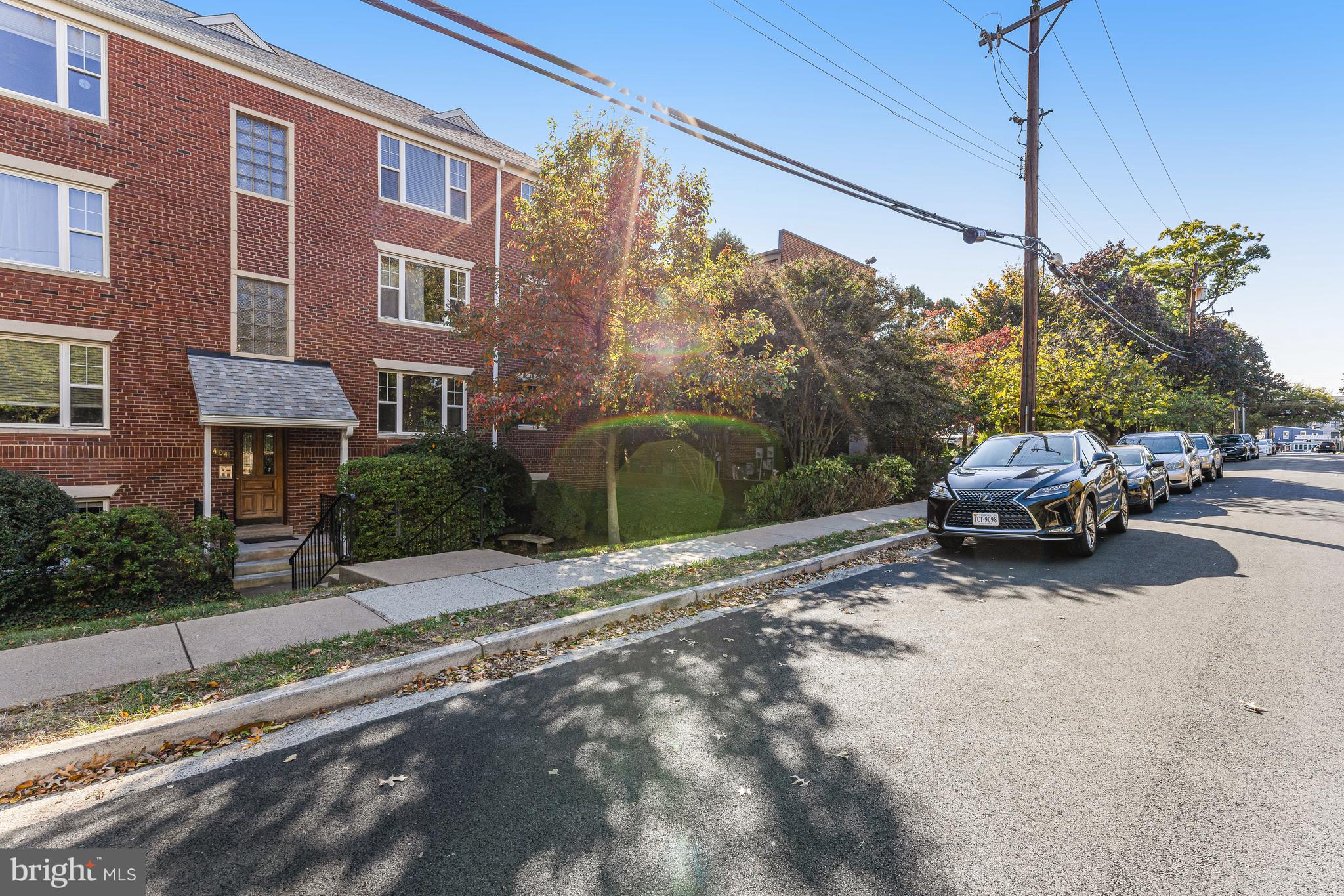 1404 12th Street North, Unit 32 Arlington, VA 22209 - Photo 24 of 26 a car parked on the side of the road