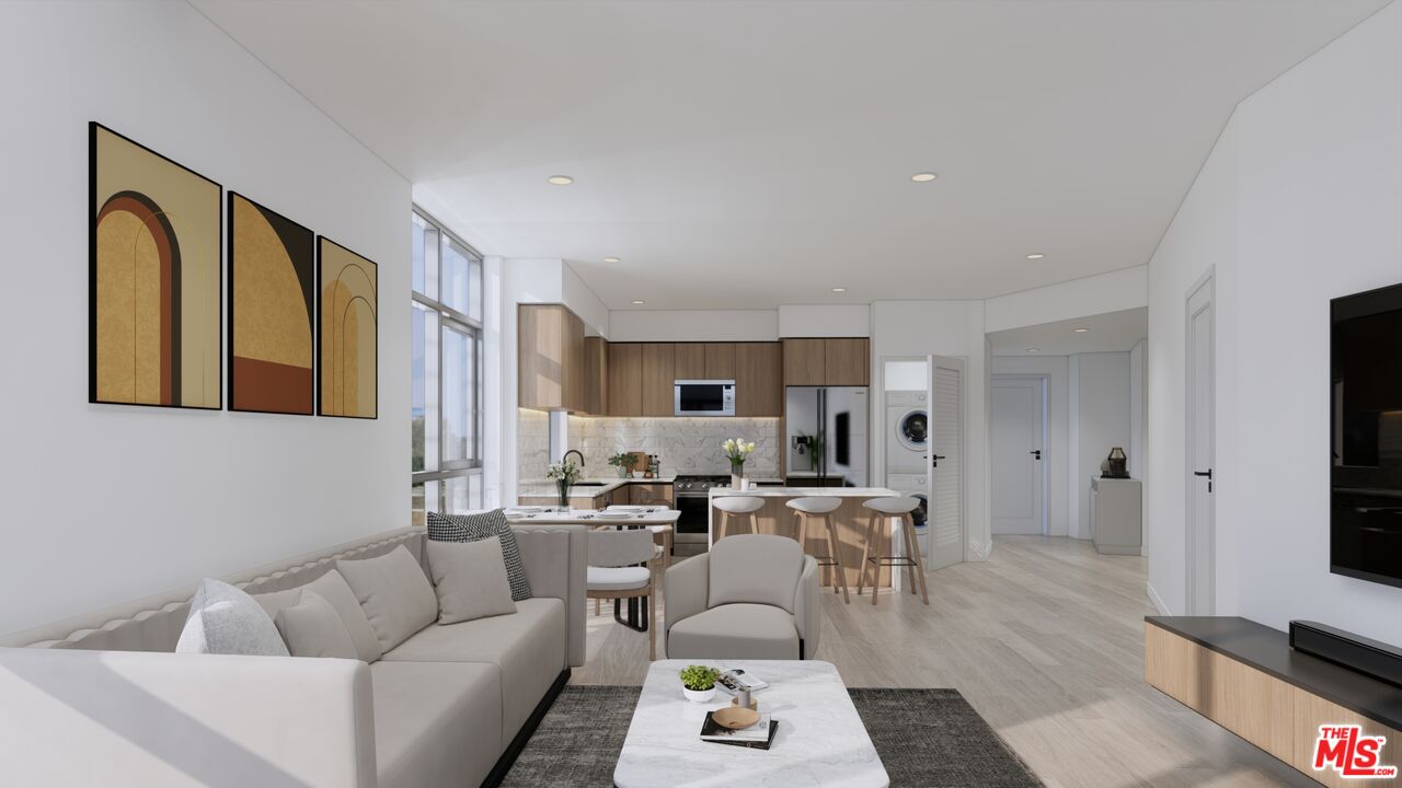 160 Chestnut Street, Unit 204 Pasadena, CA 91103 - Photo 4 of 22 a living room with furniture and a flat screen tv