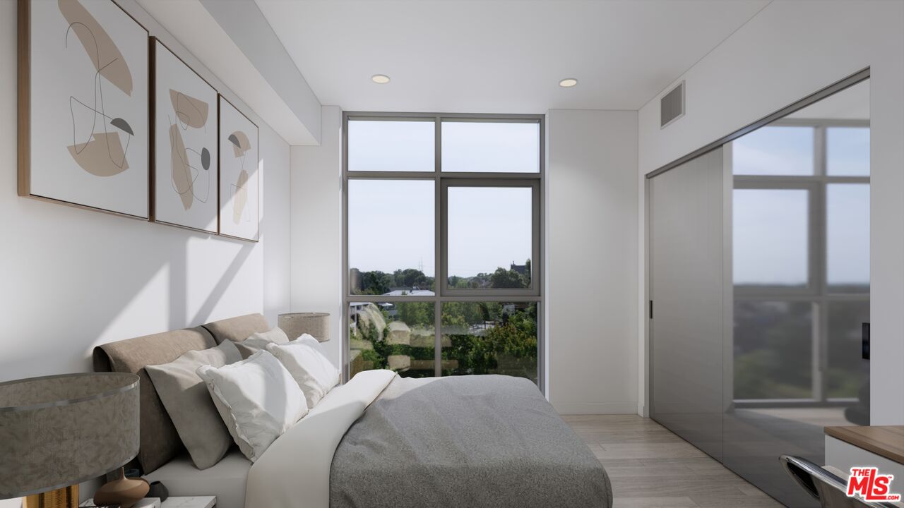 160 Chestnut Street, Unit 204 Pasadena, CA 91103 - Photo 10 of 22 a bed room with a bed and a window