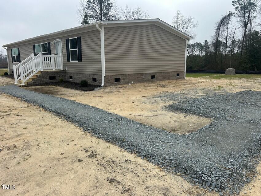 3356 North McCullen Road Faison, NC 28341 - Photo 1 of 25 a backyard of a house