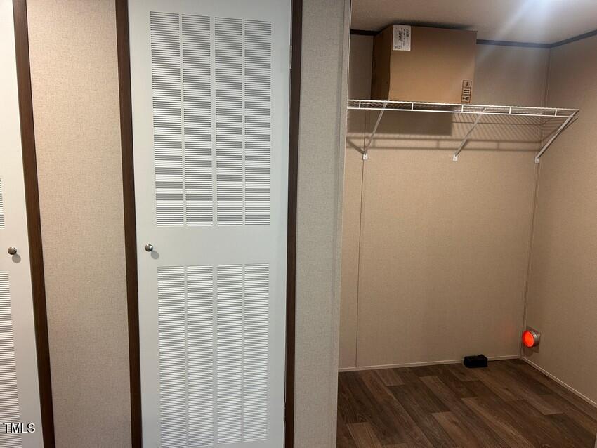 3356 North McCullen Road Faison, NC 28341 - Photo 12 of 25 a room with rack on the wall and a window