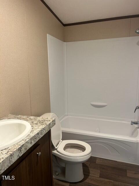 3356 North McCullen Road Faison, NC 28341 - Photo 18 of 25 a bathroom with a granite countertop bathtub toilet and a sink