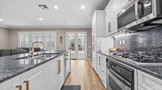 a bedroom with a bed and a desk