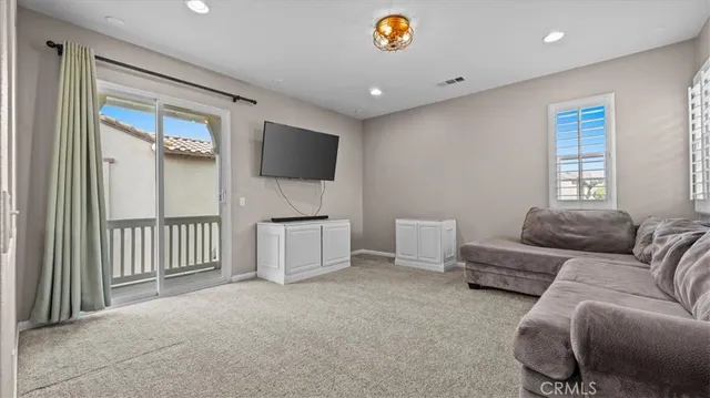 a spacious bathroom with a double vanity sink and a mirror