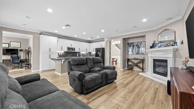 a large kitchen with stainless steel appliances granite countertop a lot of counter space