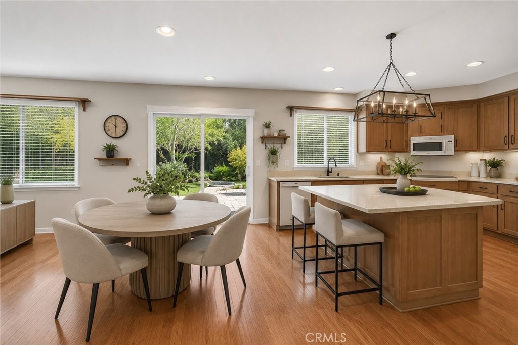 22262 Trinity Place Saugus, CA 91390 - Photo 32 of 87 AI Enhanced 9 / Kitchen & Table
