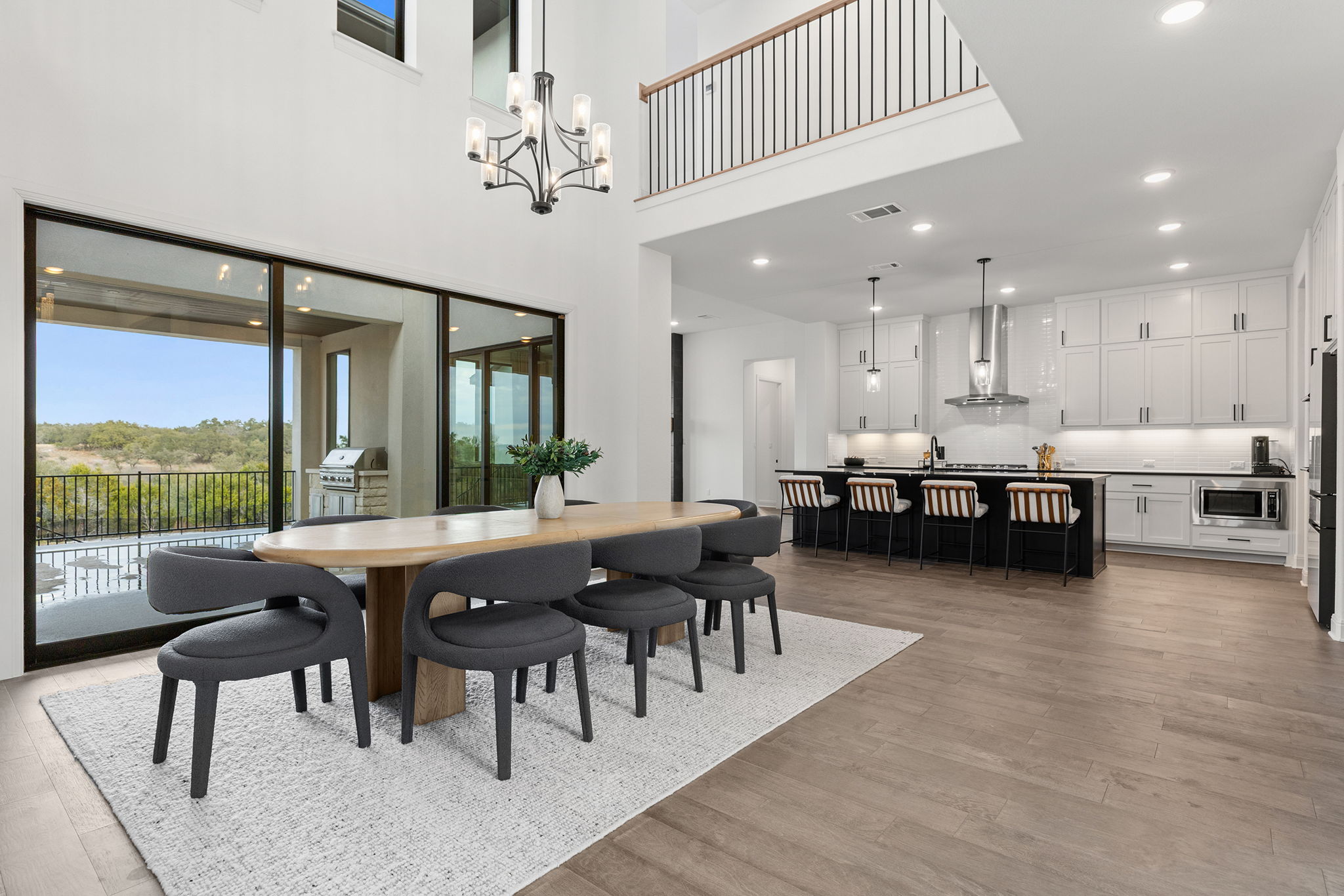 439 Wellborn Road Liberty Hill, TX 78642 - Photo 39 of 40 Open floorplan dining room flowing to kitchen. Views all around.