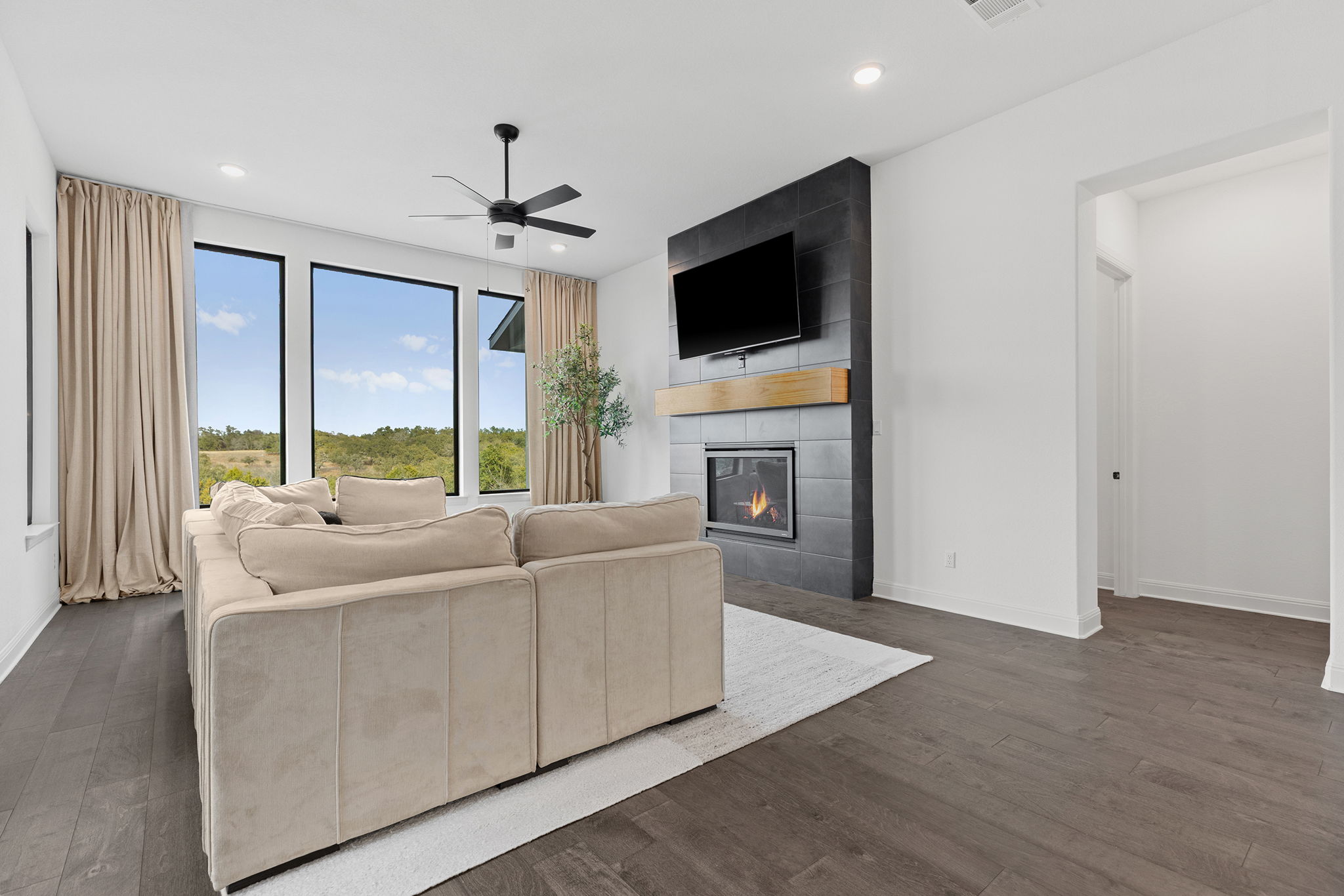 439 Wellborn Road Liberty Hill, TX 78642 - Photo 13 of 40 Large living room featuring gas fireplace