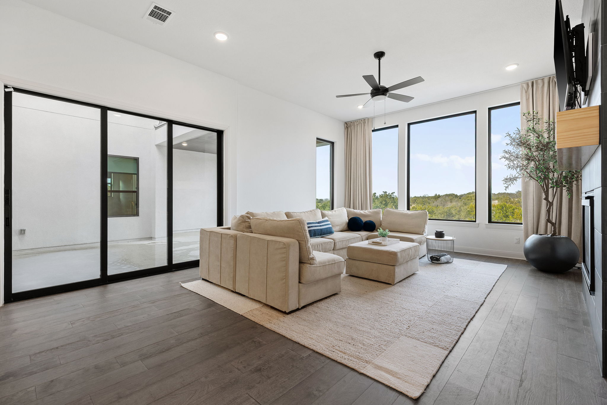 439 Wellborn Road Liberty Hill, TX 78642 - Photo 14 of 40 Large sliding doors open to outdoor entertaining