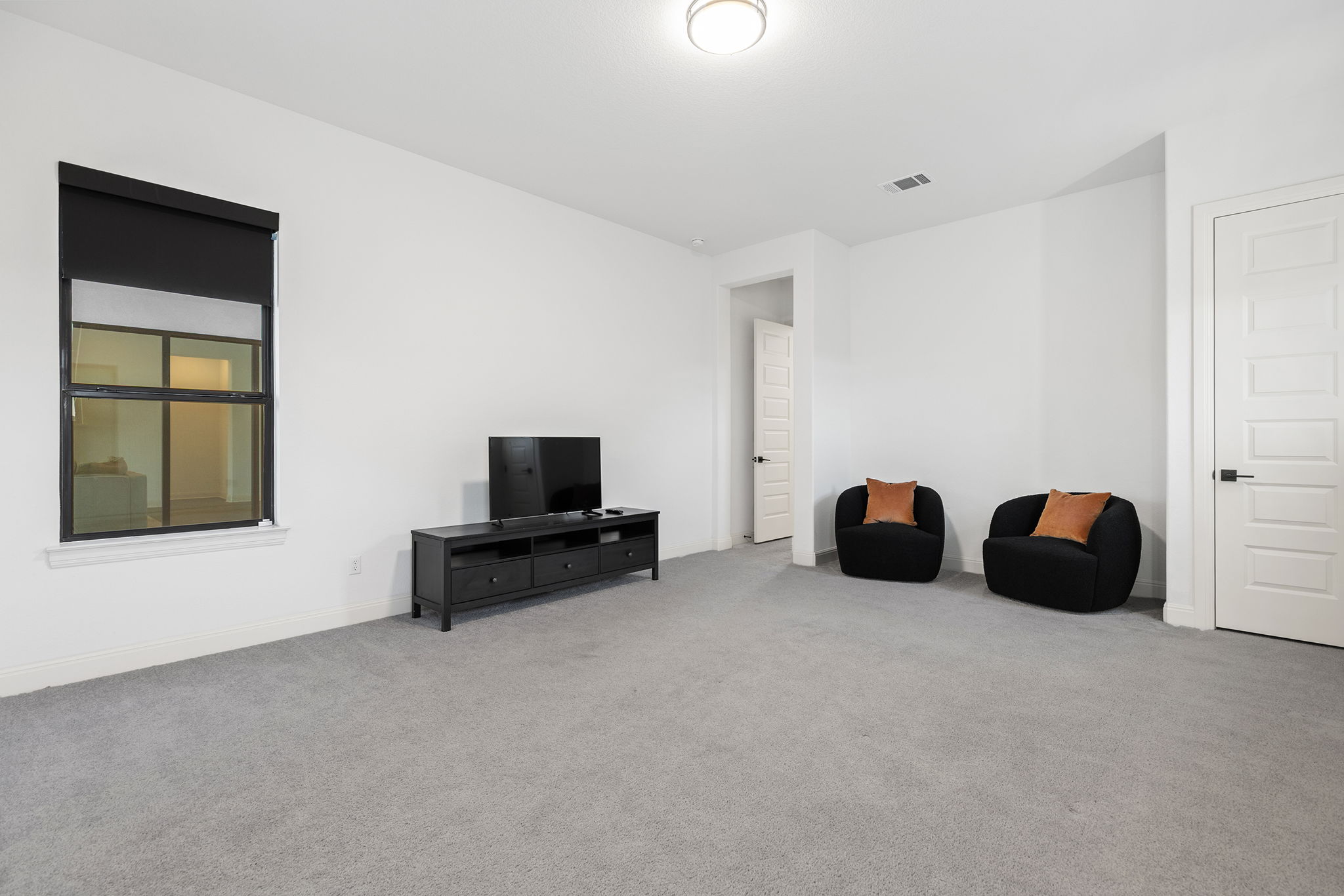 439 Wellborn Road Liberty Hill, TX 78642 - Photo 22 of 40 Main floor secondary guest room with ensuite bathroom