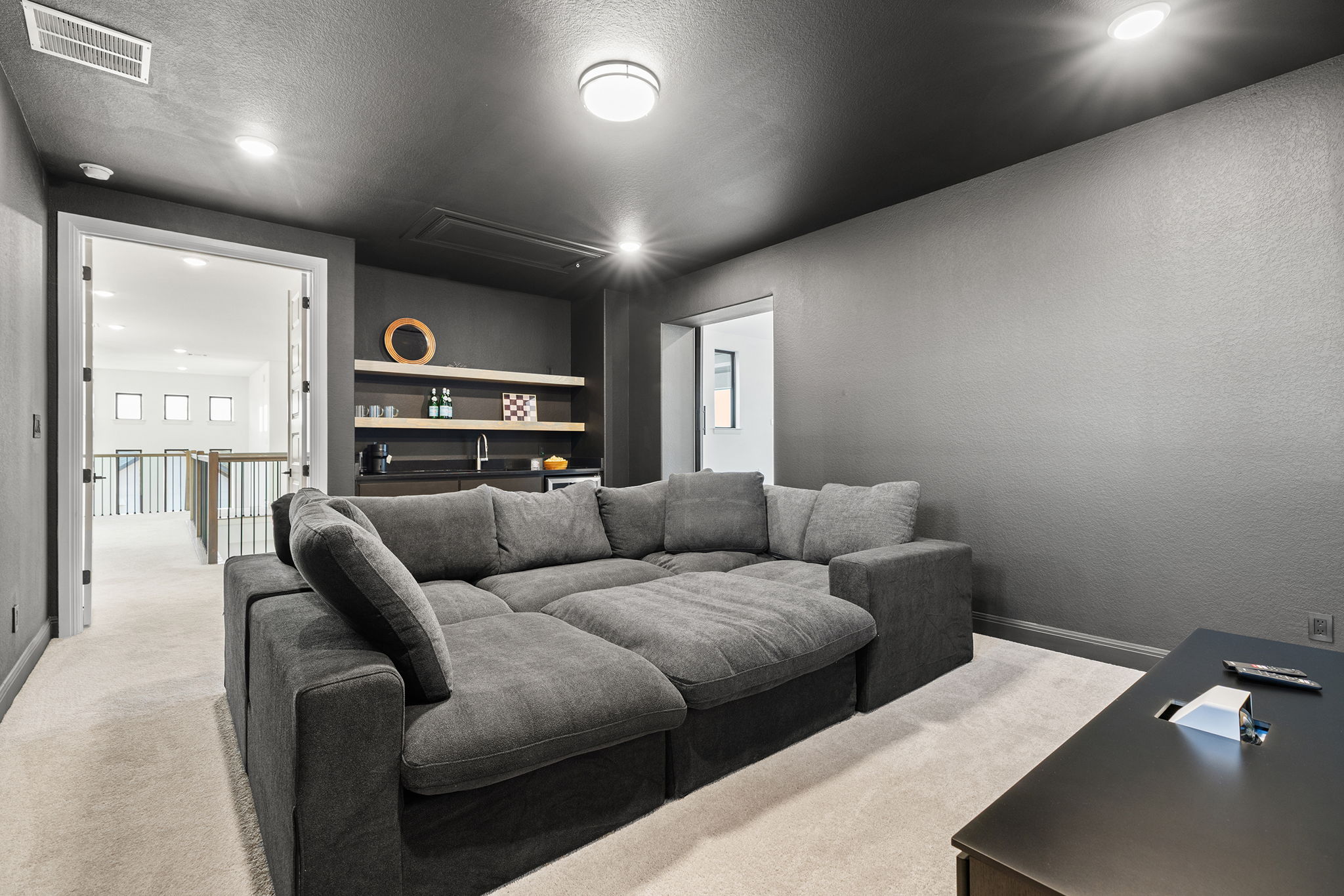 439 Wellborn Road Liberty Hill, TX 78642 - Photo 4 of 40 Upstairs media room with wet bar