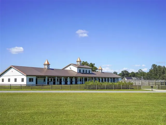 a front view of a house with a ocean view