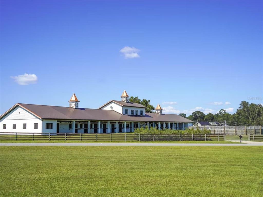 1345 Northeast 155th Place Citra, FL 32113 - Photo 2 of 82 a front view of a house with a ocean view