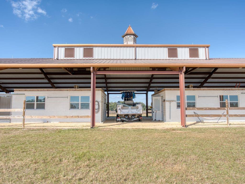 1345 Northeast 155th Place Citra, FL 32113 - Photo 26 of 82 a view of a chairs and table in the patio