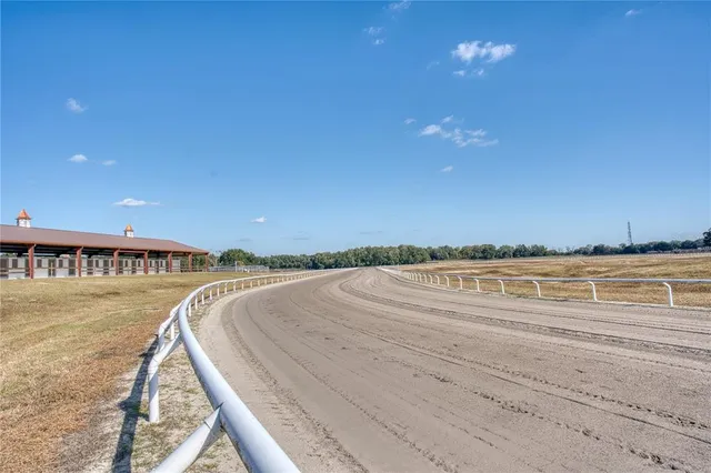 a view of an outdoor space and tennis court