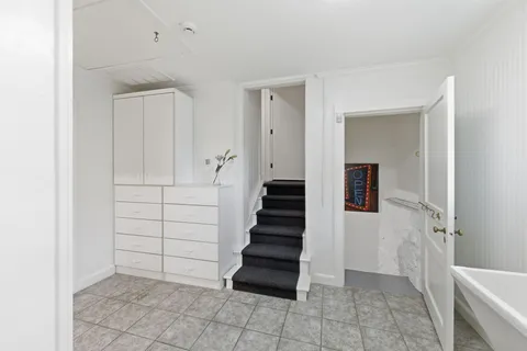 a view of an entryway with stairs