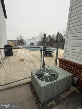 a view of roof with microwave