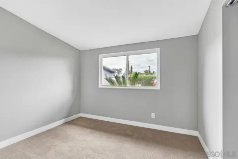 an empty room with window