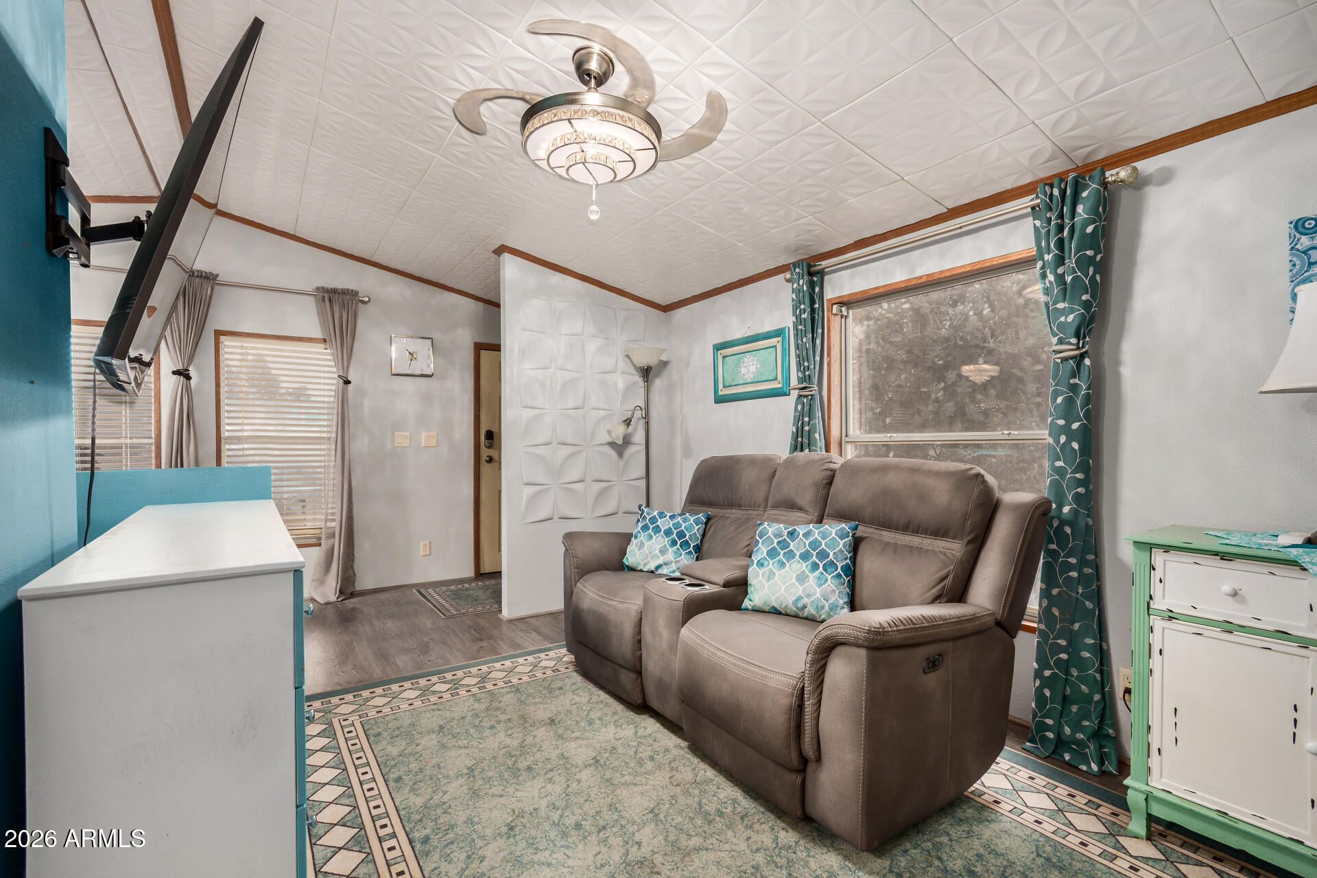 201 South Greenfield Road, Unit 239 Mesa, AZ 85206 - Photo 13 of 32 a living room with furniture and a rug