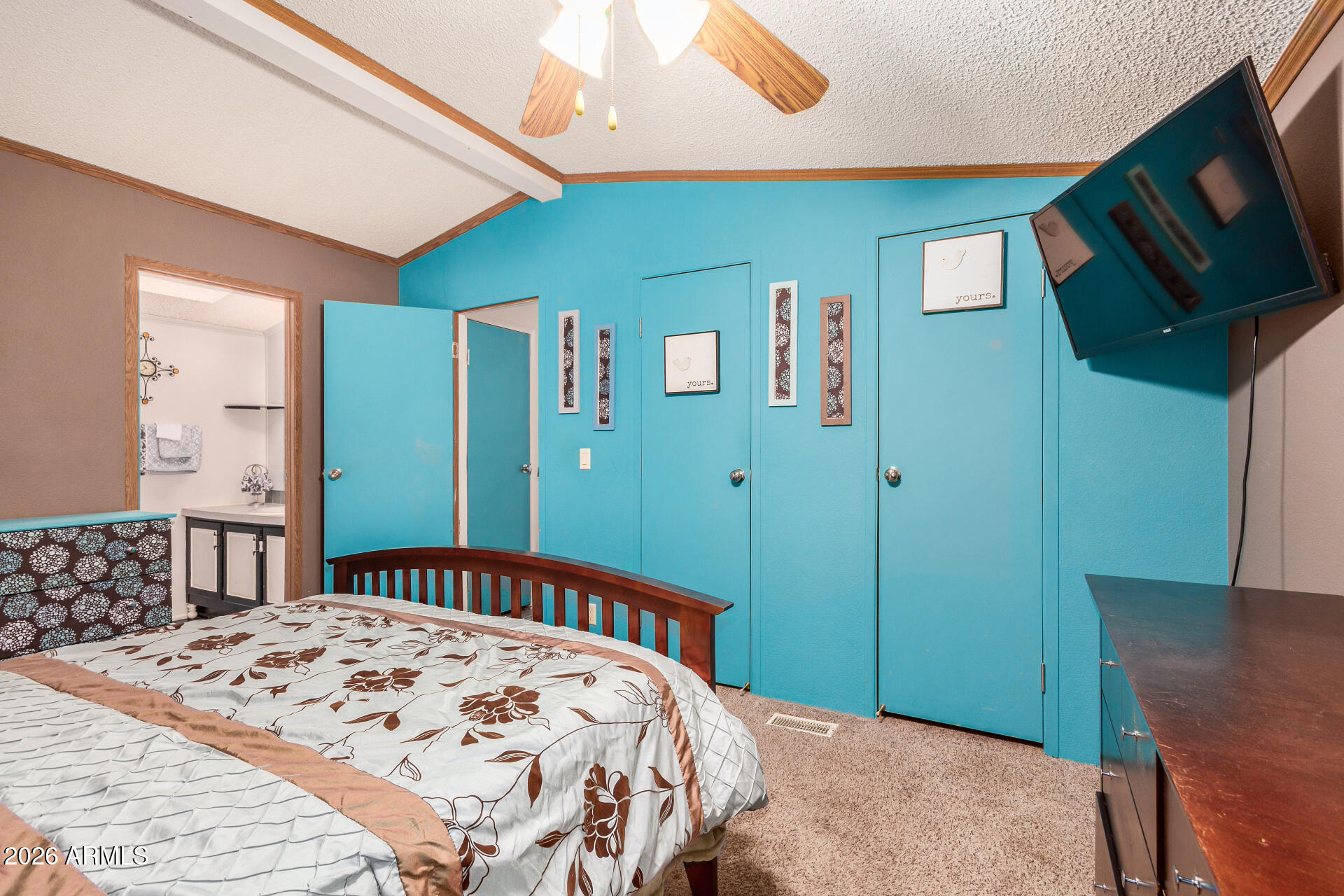 201 South Greenfield Road, Unit 239 Mesa, AZ 85206 - Photo 18 of 32 a bedroom with a bed and a mirror