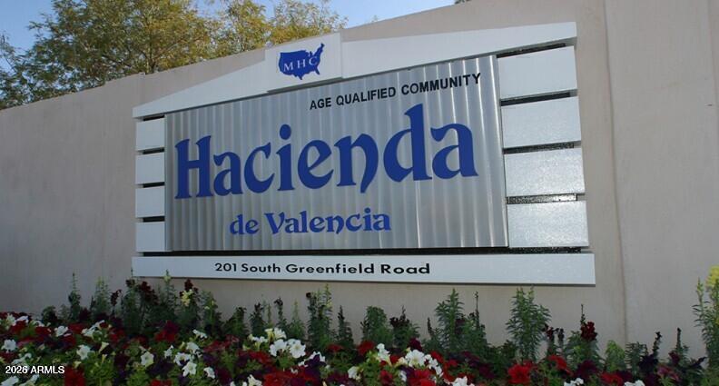 201 South Greenfield Road, Unit 239 Mesa, AZ 85206 - Photo 27 of 32 a sign on the side of a building