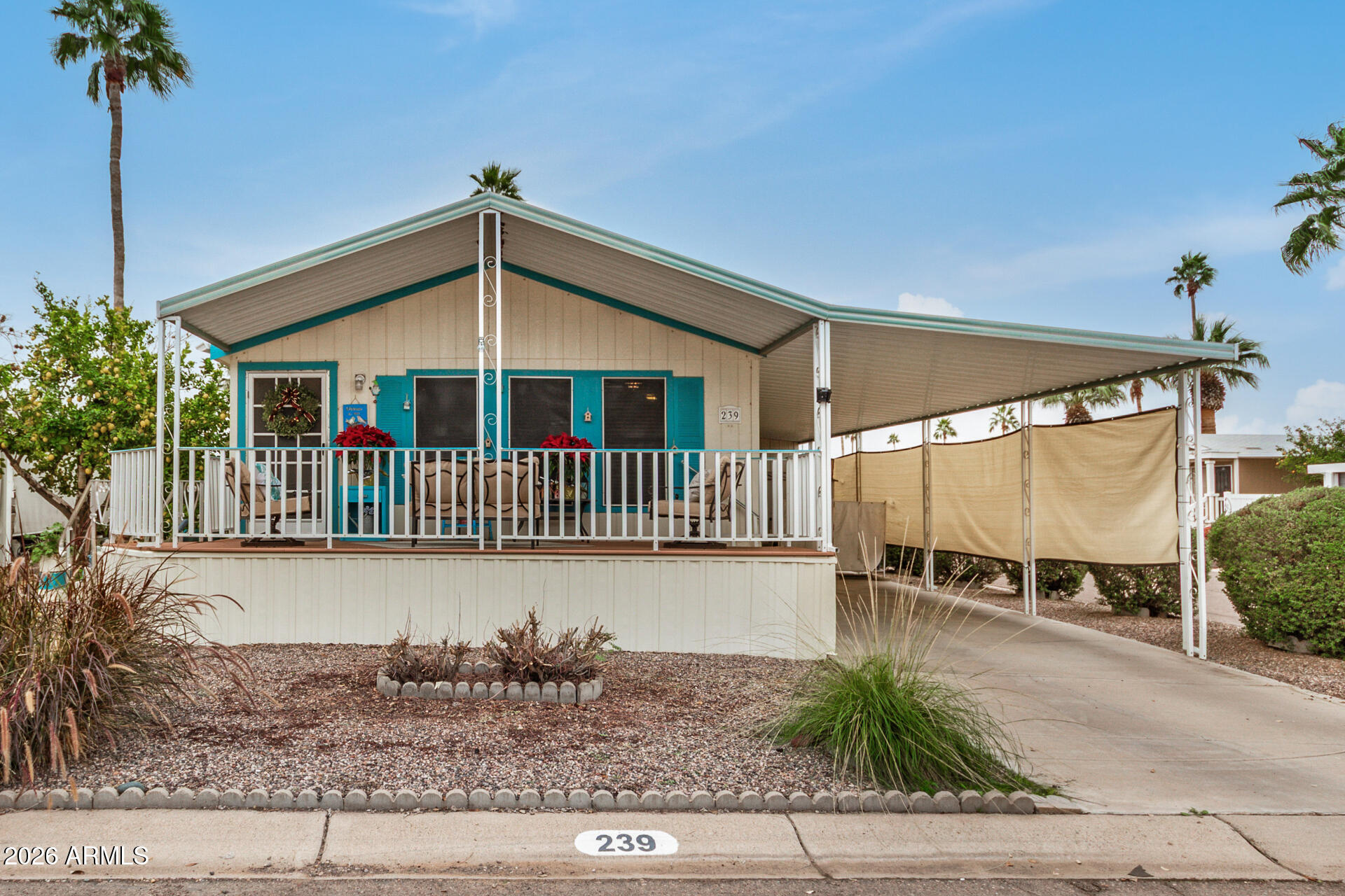 201 South Greenfield Road, Unit 239 Mesa, AZ 85206 - Photo 10 of 32 a view of a house with a deck