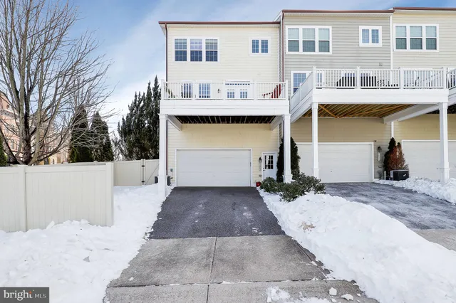 a view of a brick building next to a yard