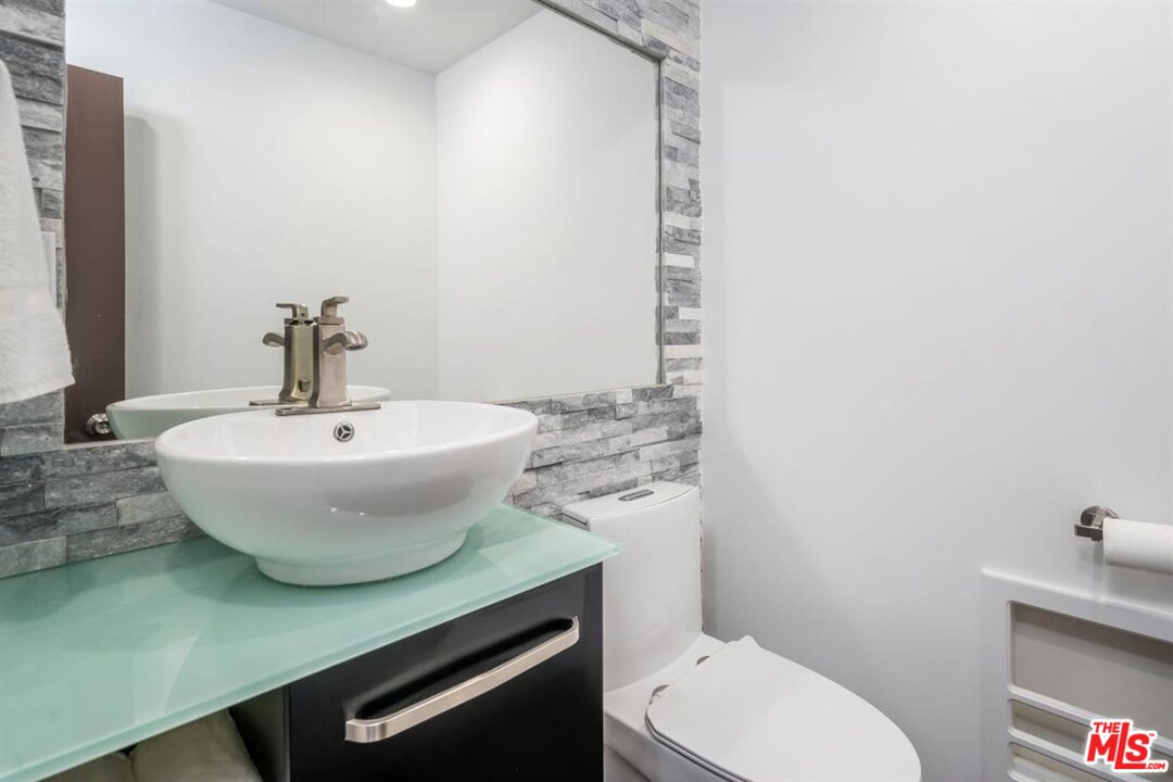 24 Westwind Street, Unit F Marina del Rey, CA 90292 - Photo 12 of 24 a bathroom with a sink and a toilet