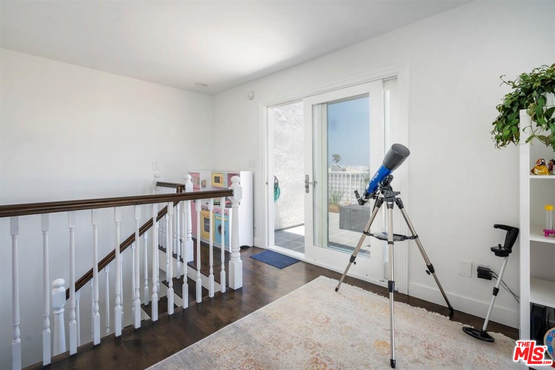 24 Westwind Street, Unit F Marina del Rey, CA 90292 - Photo 13 of 24 a view of entryway with wooden floor