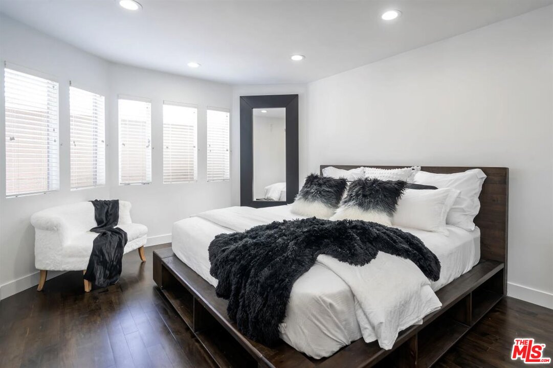 24 Westwind Street, Unit F Marina del Rey, CA 90292 - Photo 16 of 24 a bedroom with a bed and window