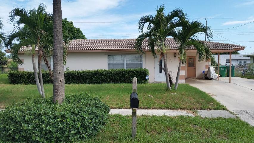 341 West 22nd Court Riviera Beach, FL 33404 - Photo 2 of 17 20241227151126327590000000-o