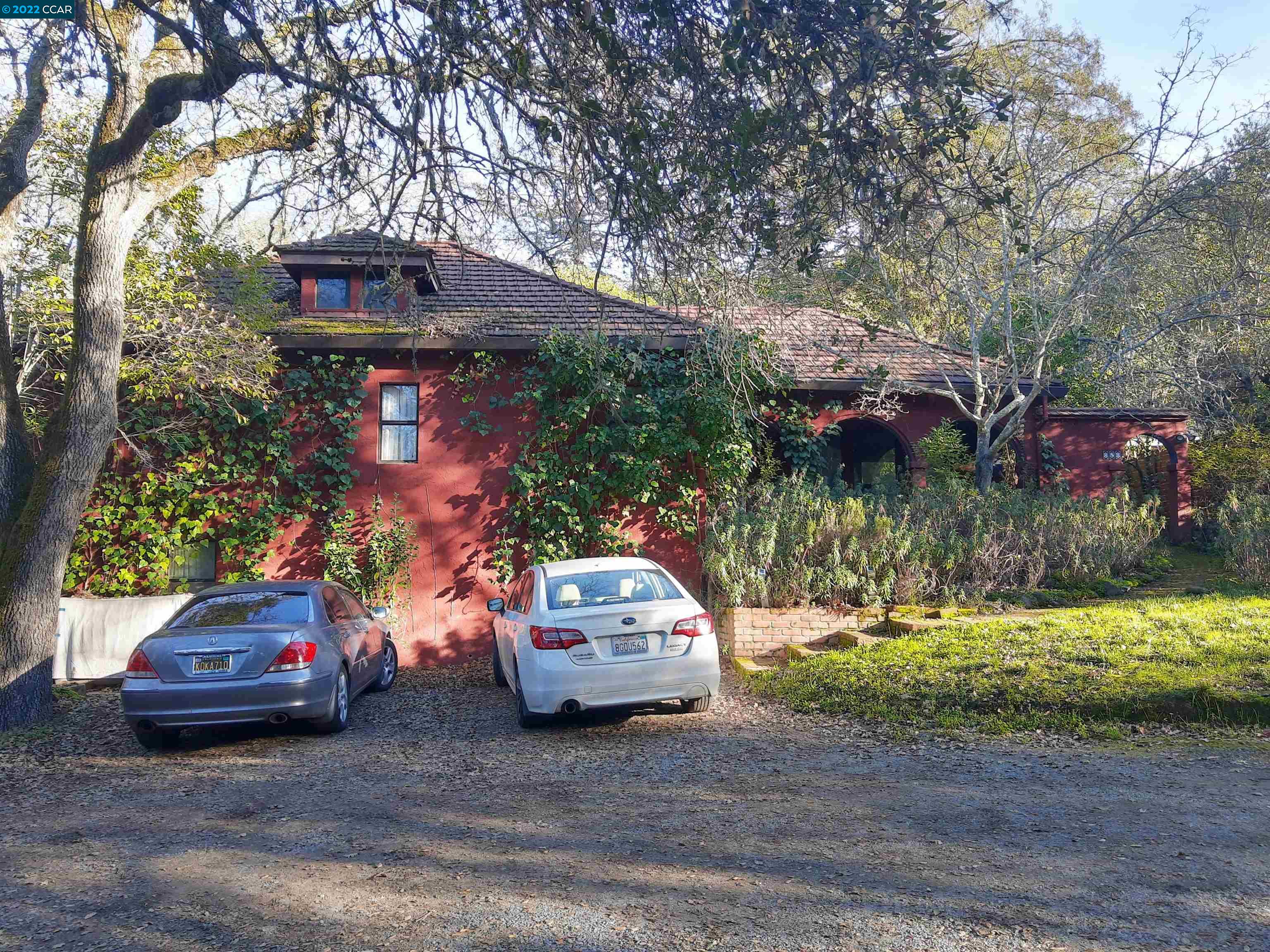 a car parked in front of a house