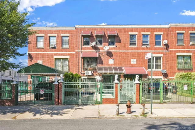 a front view of a building and street