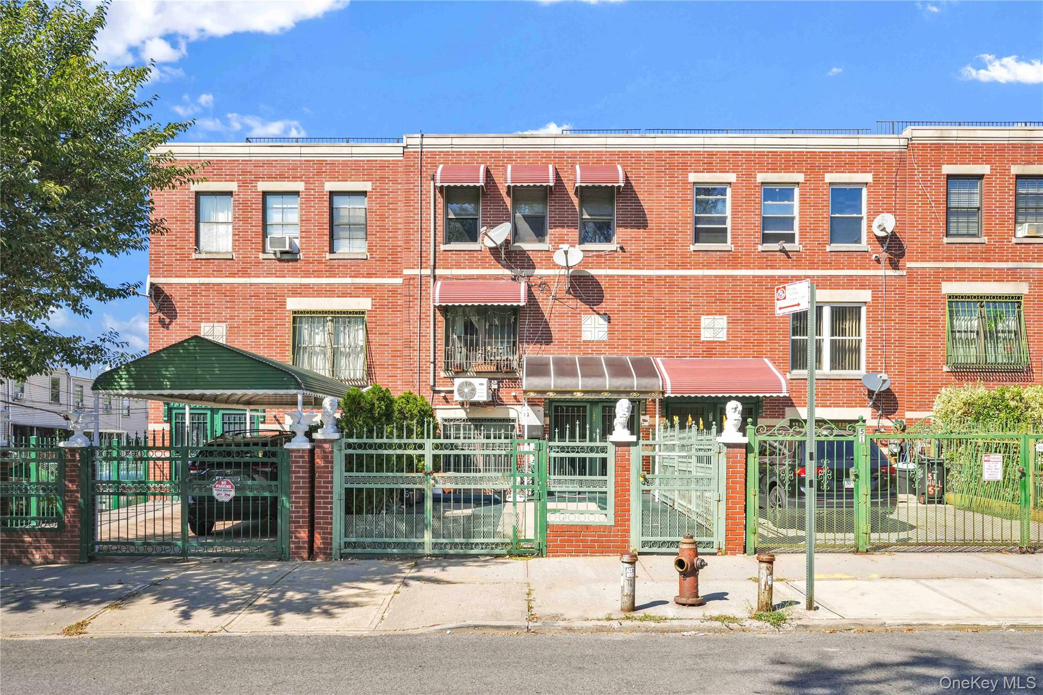 49 Hull Street Brooklyn, NY 11233 - Photo 1 of 31 a front view of a building and street